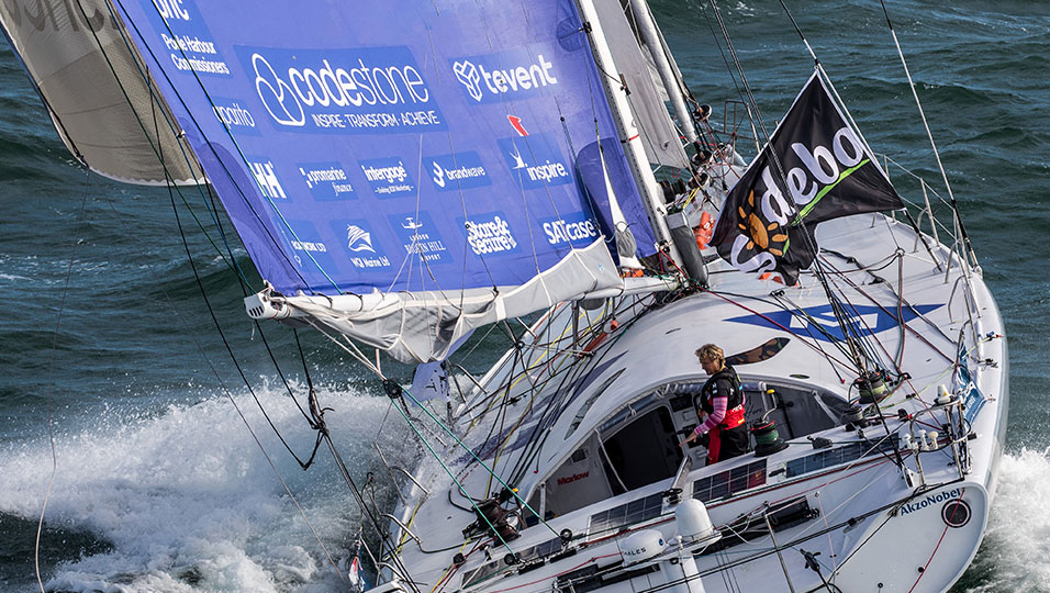 A sportswoman on a boat sponsored by Codestone.